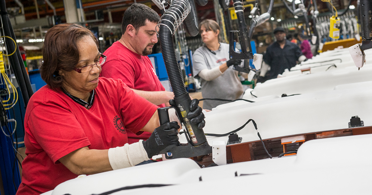 woman working on the assembly line at the General Motors assembly plant in Fort Wayne