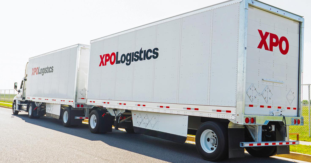 semi truck pulling two XPO Logistics trailers