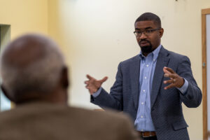 iric headley gives a presentation at an allen county leaders luncheon