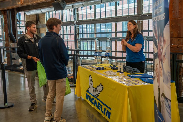company sponsor table at the 2025 Intern Experience kick-off event