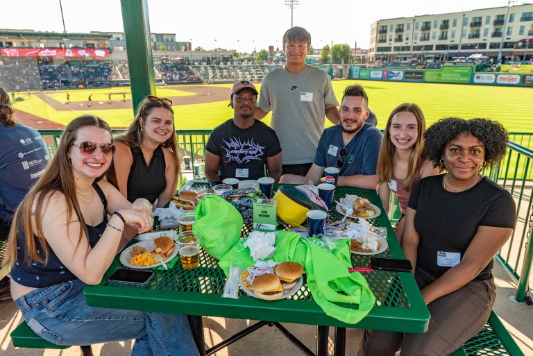 intern experience participants at Fort Wayne TinCaps baseball game