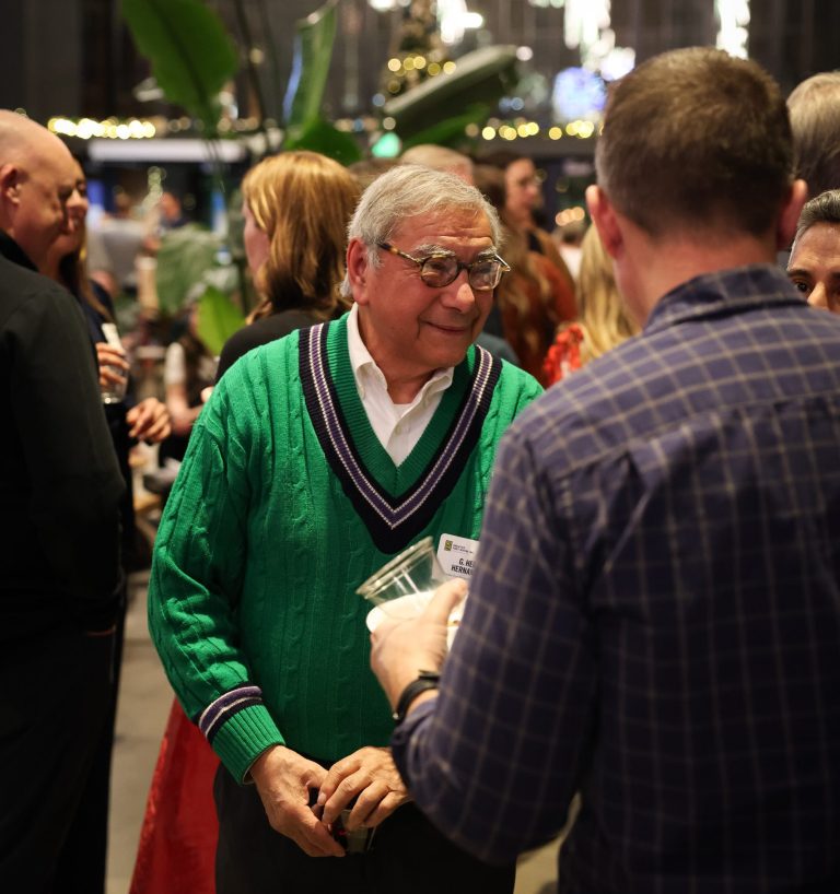 Attendees chatting during Holiday Night Event 2025