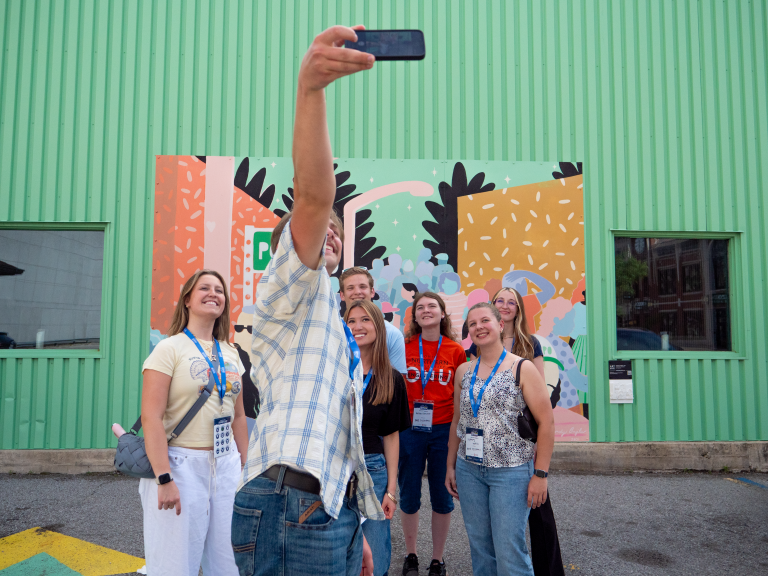 Interns participating in a scavenger hunt at Promenade Park.